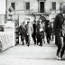 28 fotografie in bianco e nero di dimensioni diverse di Pietro Gazzera da solo e con persone diverse durante incontri ufficiali