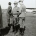 123 fotografie in bianco e nero di dimensioni diverse raffiguranti Pietro Gazzera con persone diverse in ambienti militari italiani e esteri